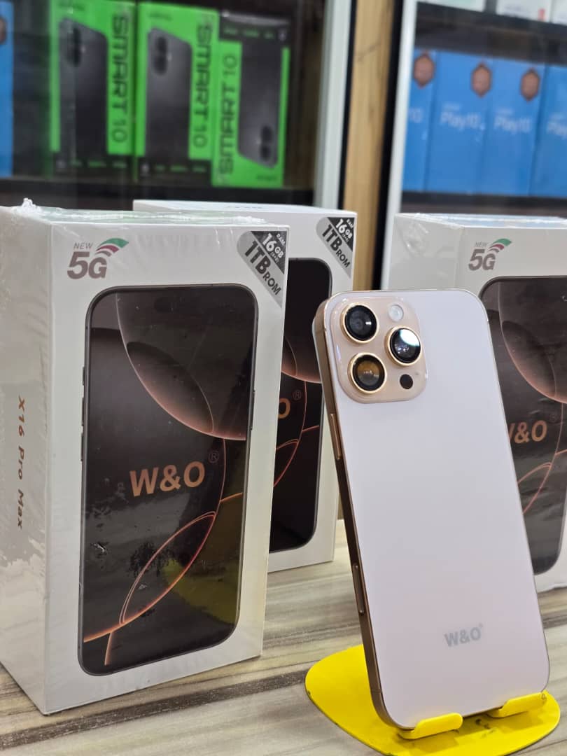 آيفون في العين … وتوفير في الجيب 👌💸  W&O X16 Pro Max📱:- جهاز نازل بنفس تصميم آيفون 16برو ماكس بالمقاس، حرفيا ولا غلطة😳  💠شاشة بحجم 6.9انش عالية الدقة🌈، بنفس ثيمات وخلفيات الآيفون🔥 💠بطارية 5000mAh🔋، بتقفل معاك اليوم بي مزاج✨ 💠كاميرا خلفية أساسية بدقة 16MP📸